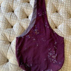 Fabric, lined Bag 15x10. 15 inch Strap. Lining feels like polyester crepe